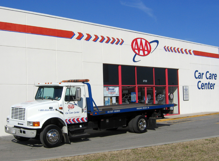 Car Care Center flatbed tow truck