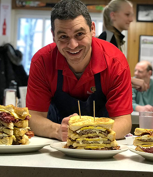 Owner Earl Handy with breakfast sandwiches