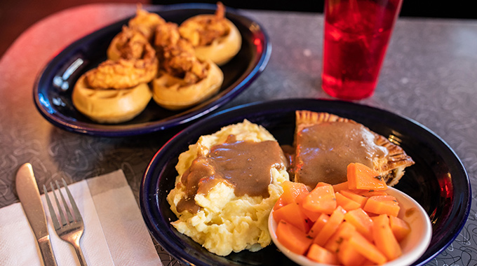 Chicken and waffles and pork pie dinner Blue Plate Specials